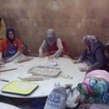      Turkish women making flat bread,
     May 18 2013