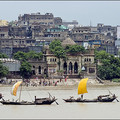 The Armenian Ghats. Kolkata  Boats going upstream on the Hooghly river in Kolkata. Shot from the Howrah bridge.