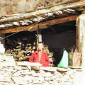 December 2003, a Nepali ani in front of her hut in Manang, Nepal